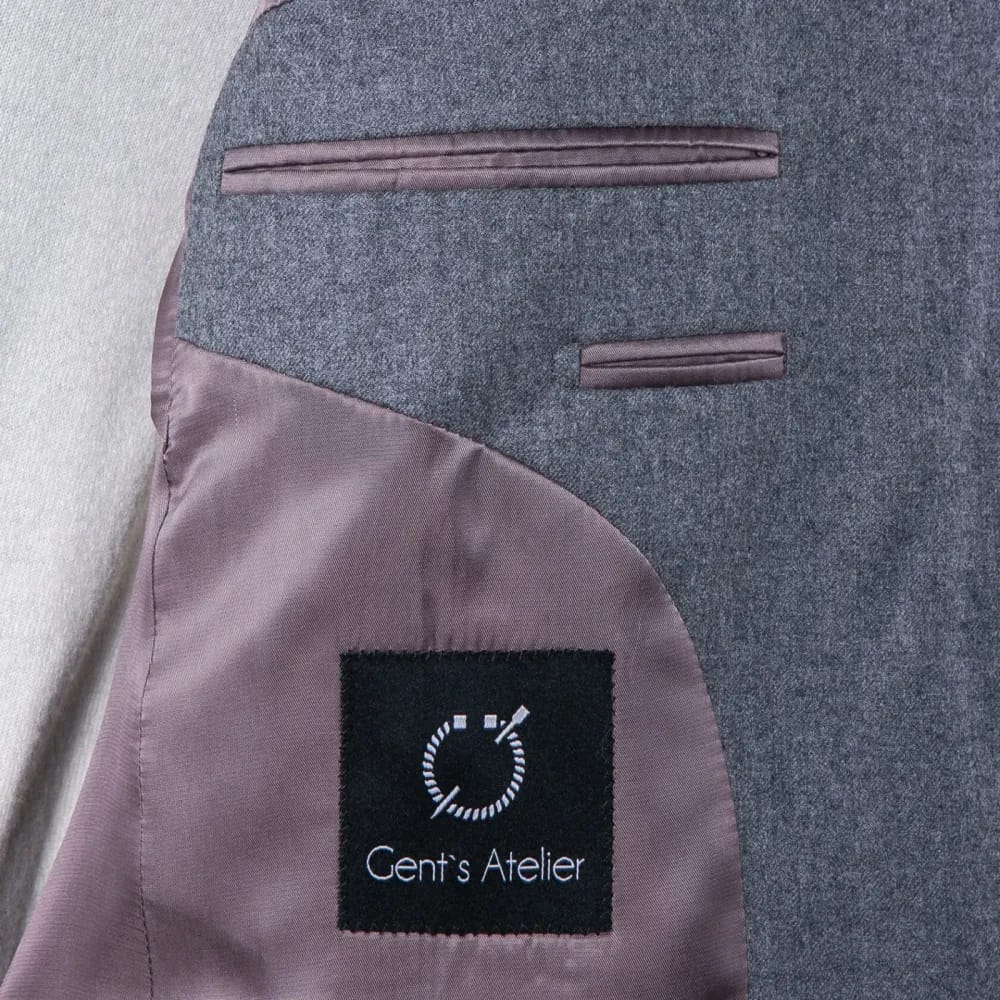 Внутренняя сторона серого фланелевого пиджака с лейблом Gent's Atelier