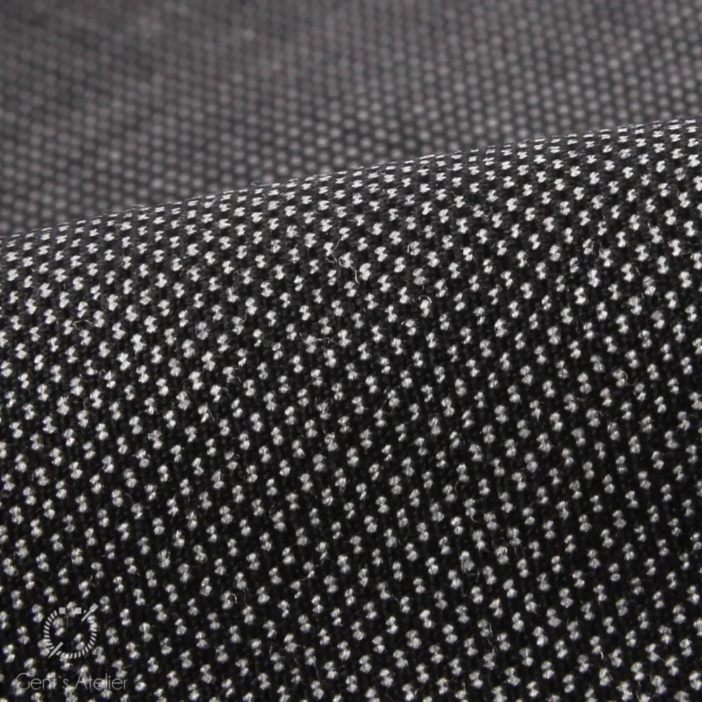 Крупный план ткани Scabal — чёрно-белый мелкий рисунок