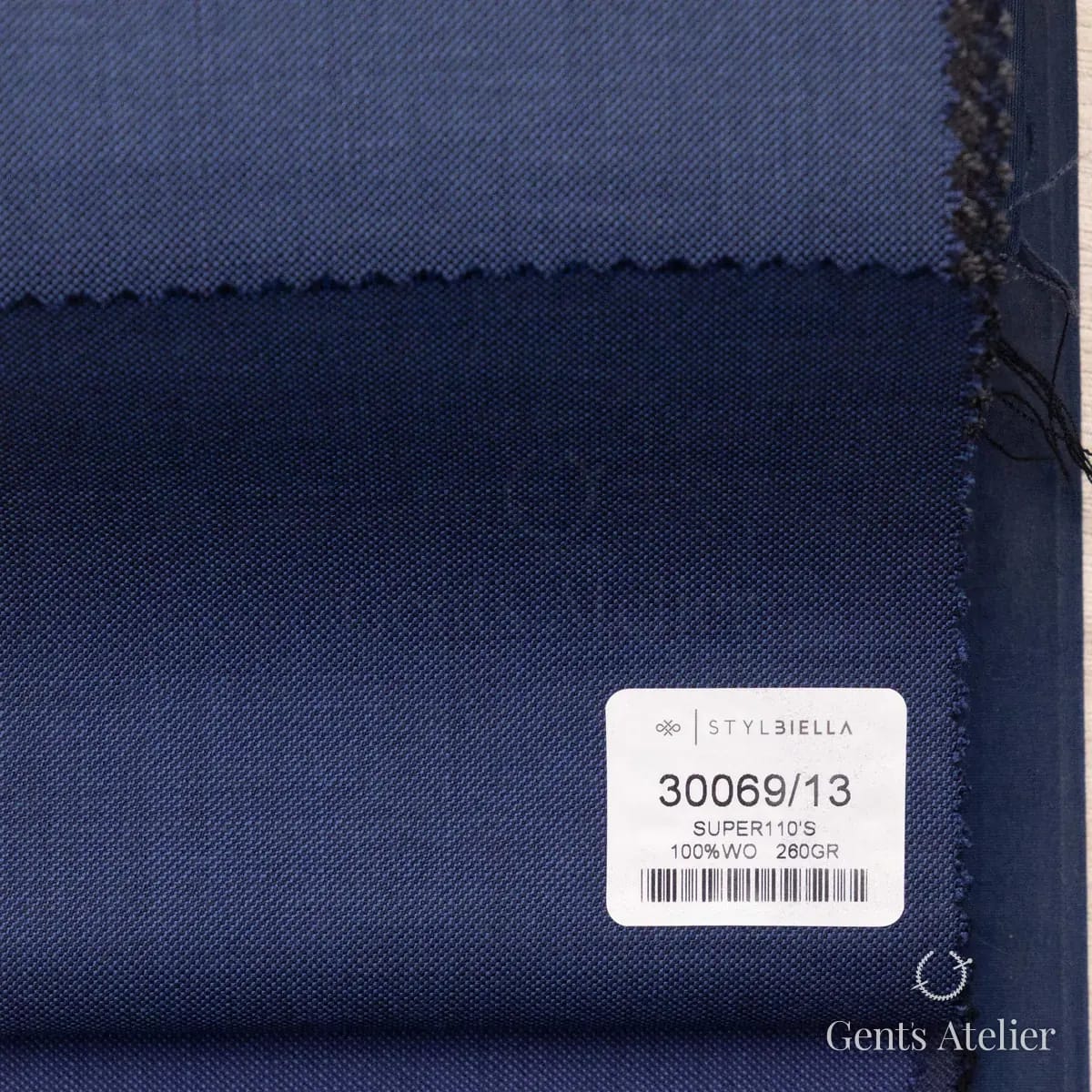Образец ткани Stylbiella 30069/13 с этикеткой, синий
