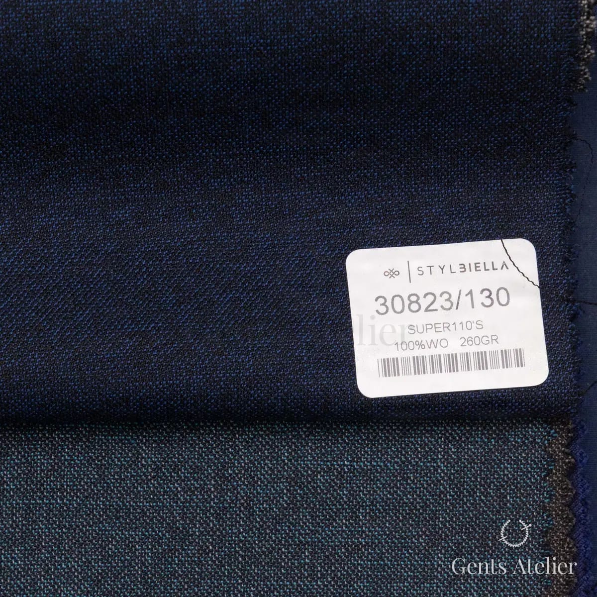 Образец ткани Stylbiella 30823/130 с этикеткой, тёмно-синий