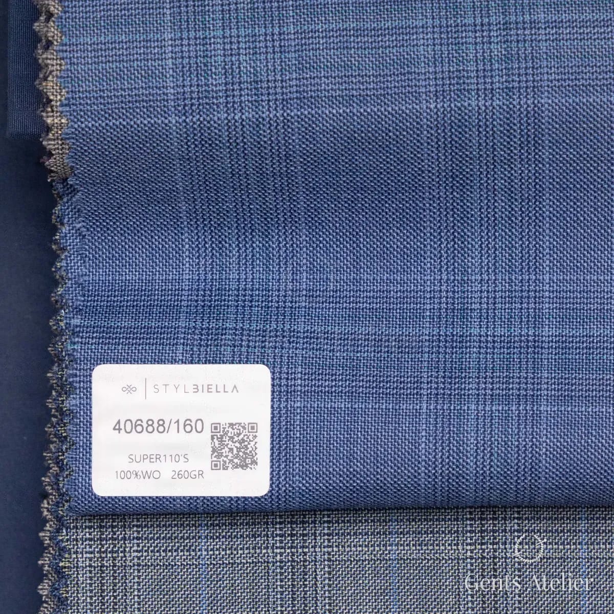 Образец ткани Stylbiella 40688/160 с этикеткой, синий