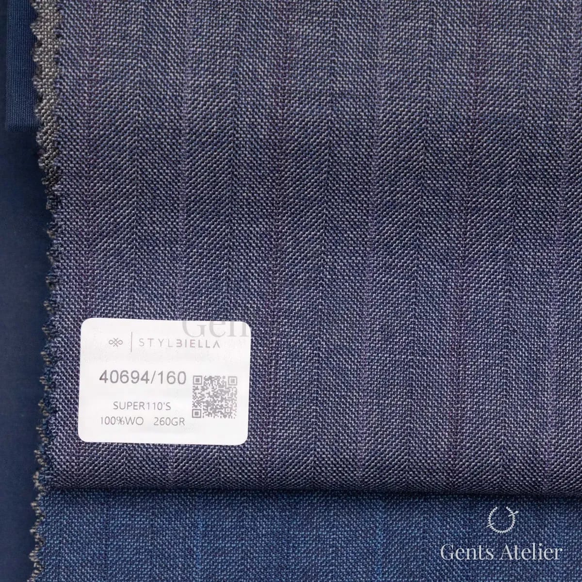 Образец ткани Stylbiella 40694/160 с этикеткой, синий