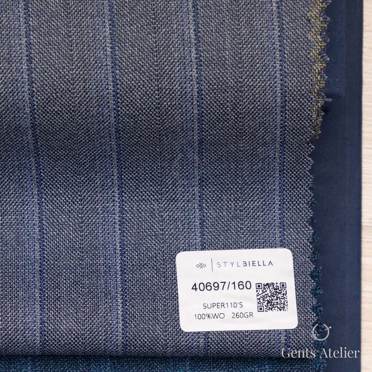 Образец ткани Stylbiella 40697/160 с этикеткой, синий