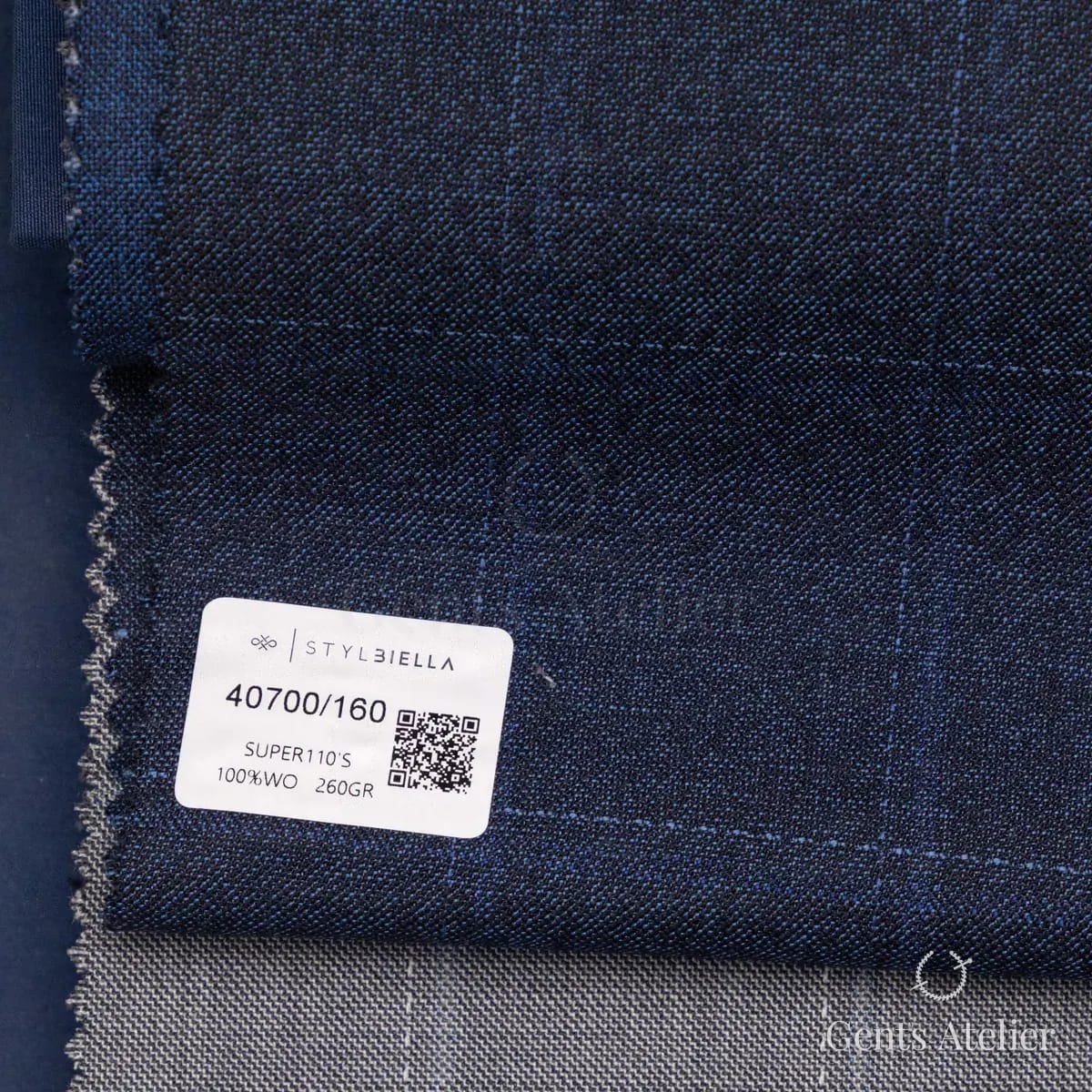 Образец ткани Stylbiella 40700/160 с этикеткой, тёмно-синий