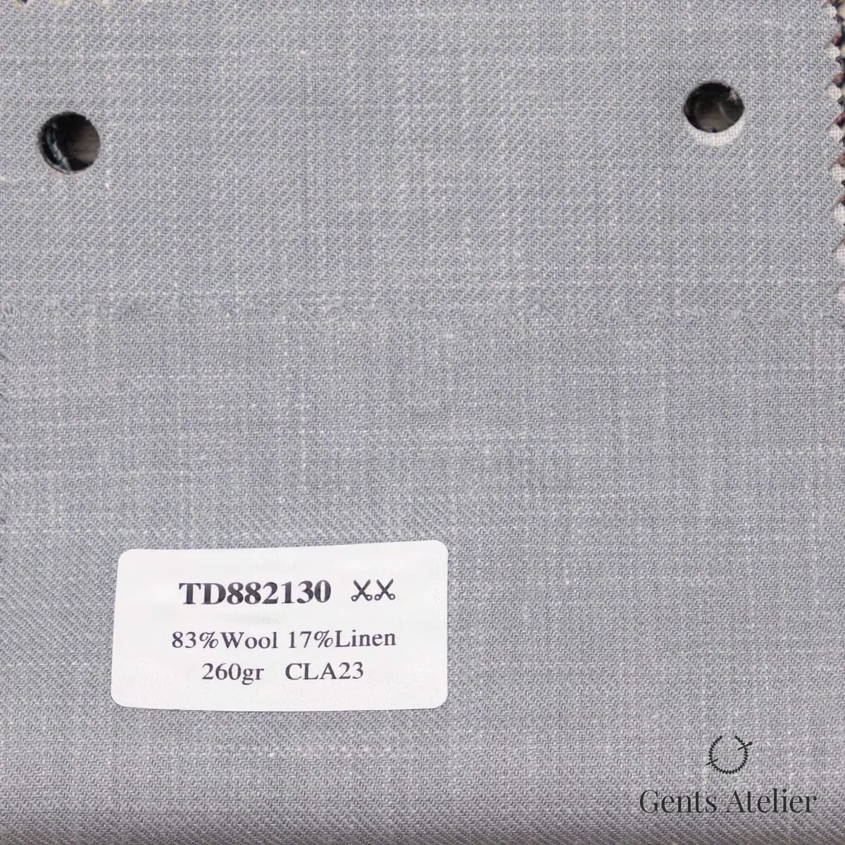 Образец ткани Dormeuil TD882130 с этикеткой, светло-серый