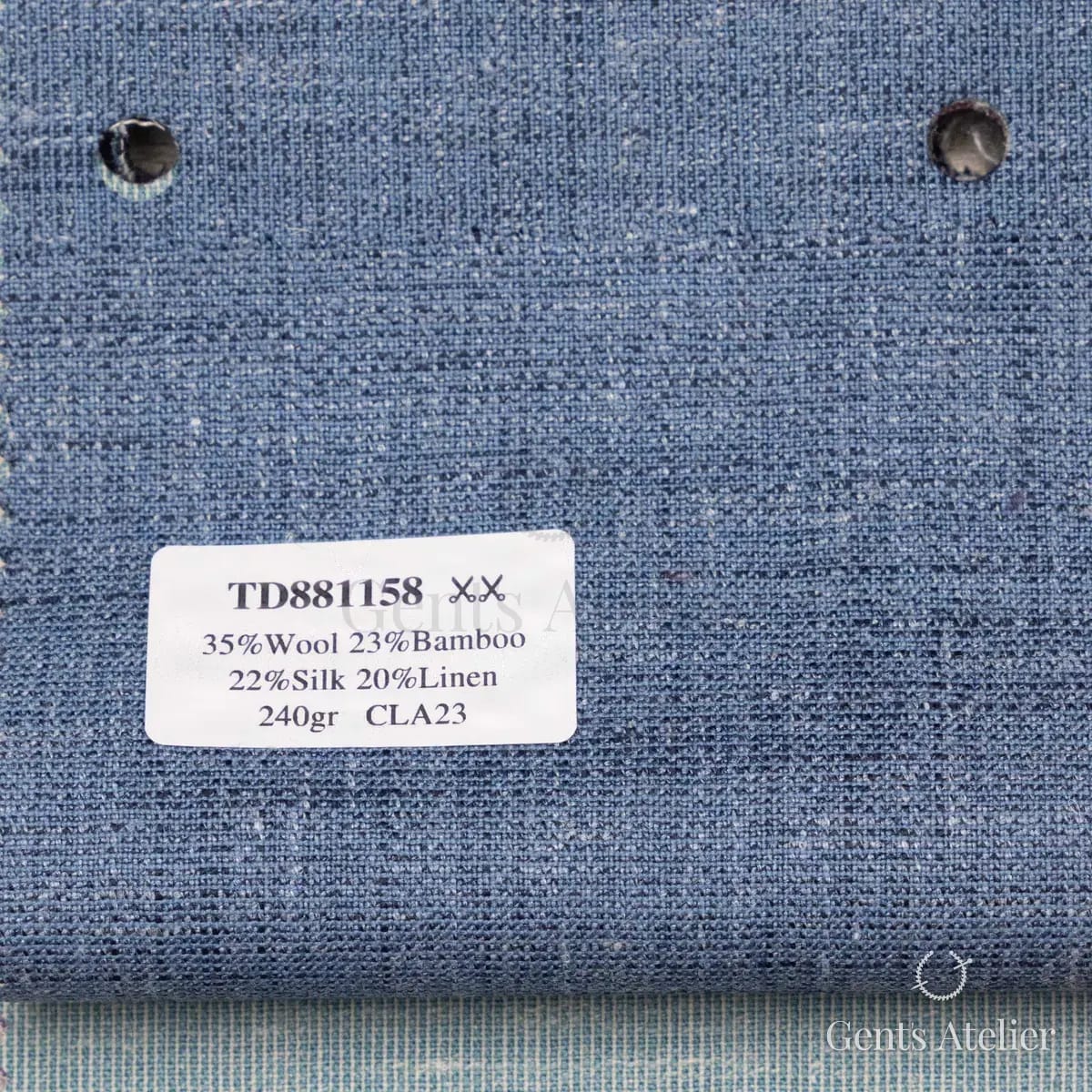 Образец ткани Dormeuil TD881158 с этикеткой, синий