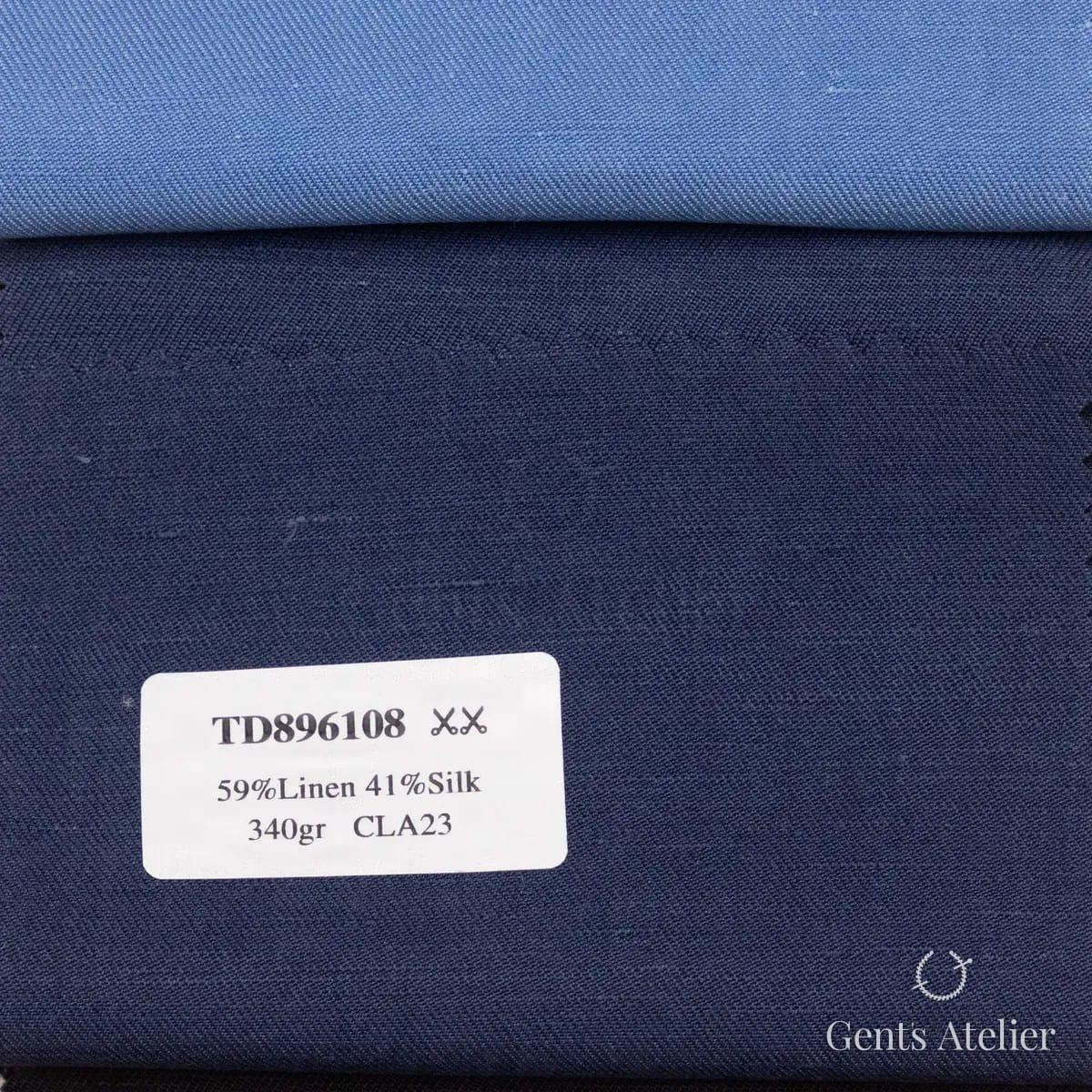 Образец ткани Dormeuil TD896108 с этикеткой, тёмно-синий