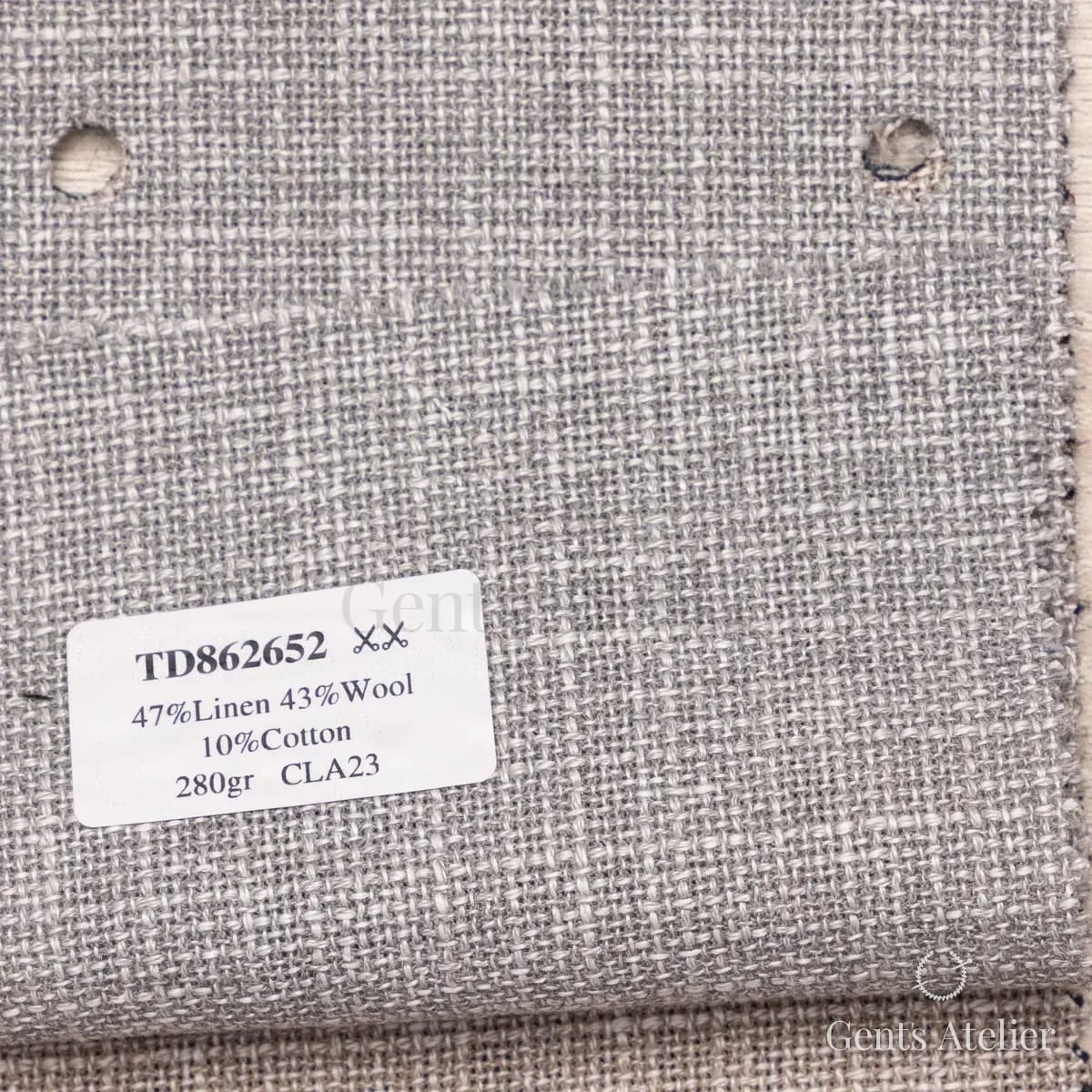 Образец ткани Dormeuil TD862652 с этикеткой, светло-серый