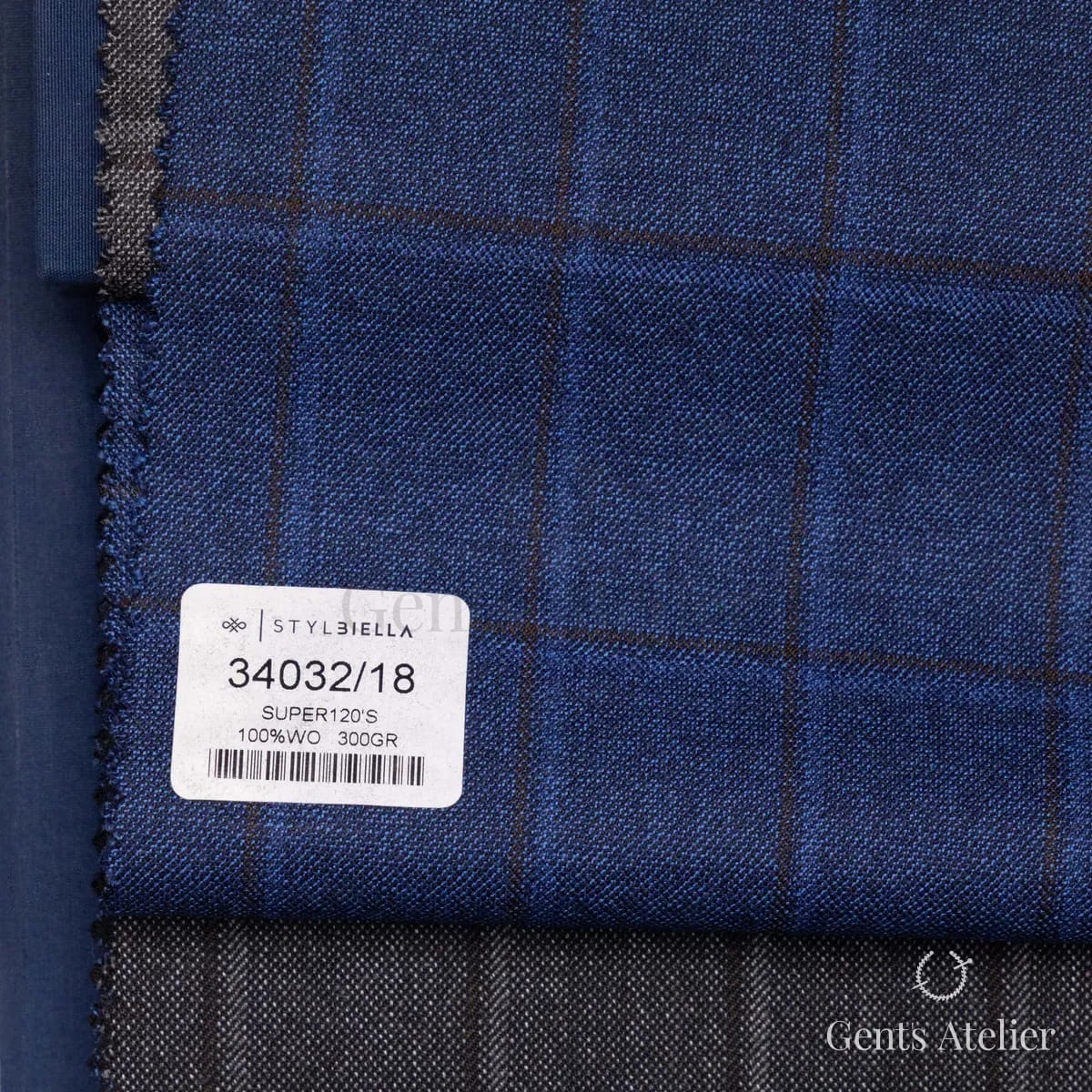 Образец ткани Stylbiella 34032/18 с этикеткой, синий