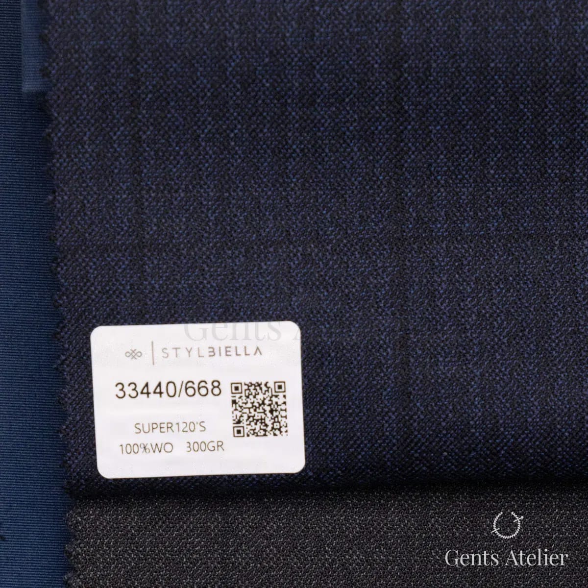 Образец ткани Stylbiella 33440/668 с этикеткой, тёмно-синий