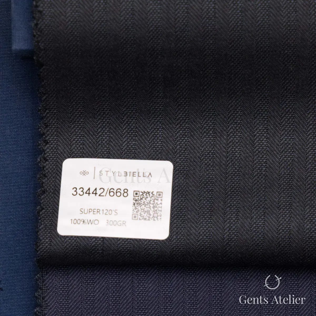 Образец ткани Stylbiella 33442/668 с этикеткой, тёмно-синий