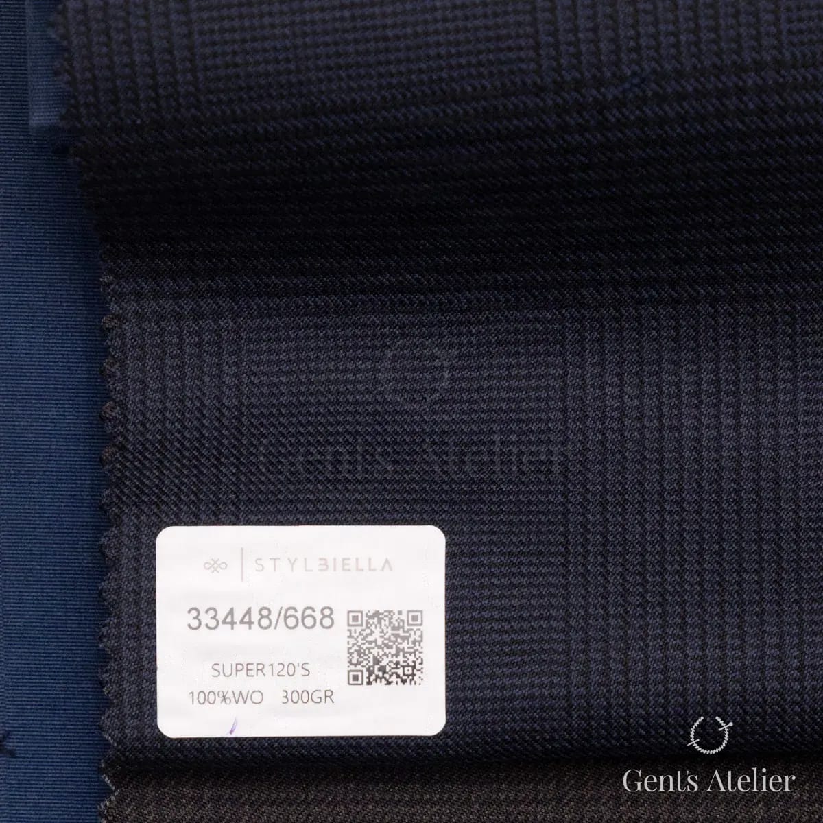 Образец ткани Stylbiella 33448/668 с этикеткой, тёмно-синий
