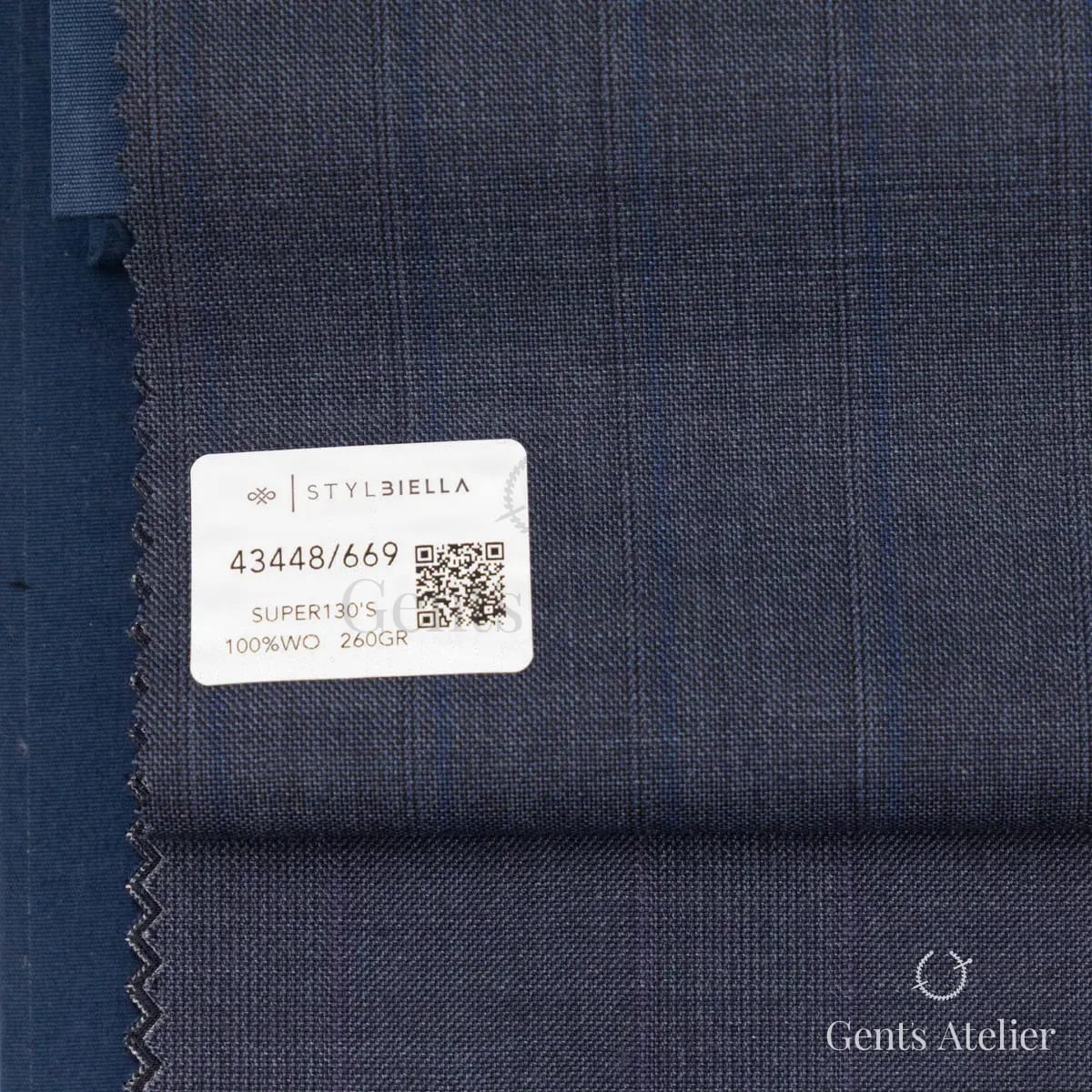 Образец ткани Stylbiella 43448/669 с этикеткой, тёмно-синий