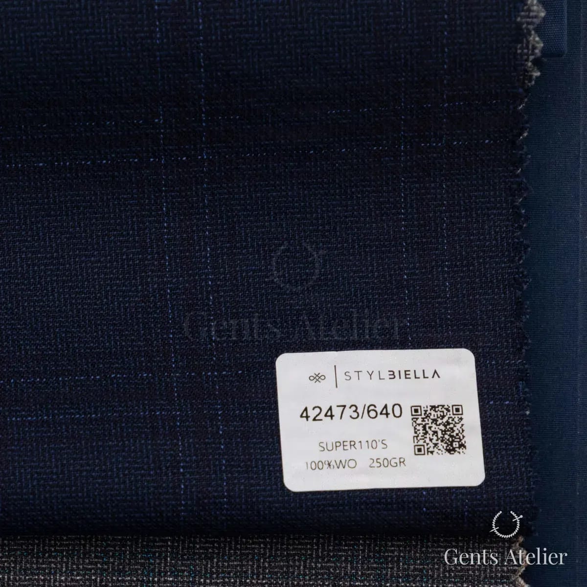 Образец ткани Stylbiella 42473/640 с этикеткой, тёмно-синий
