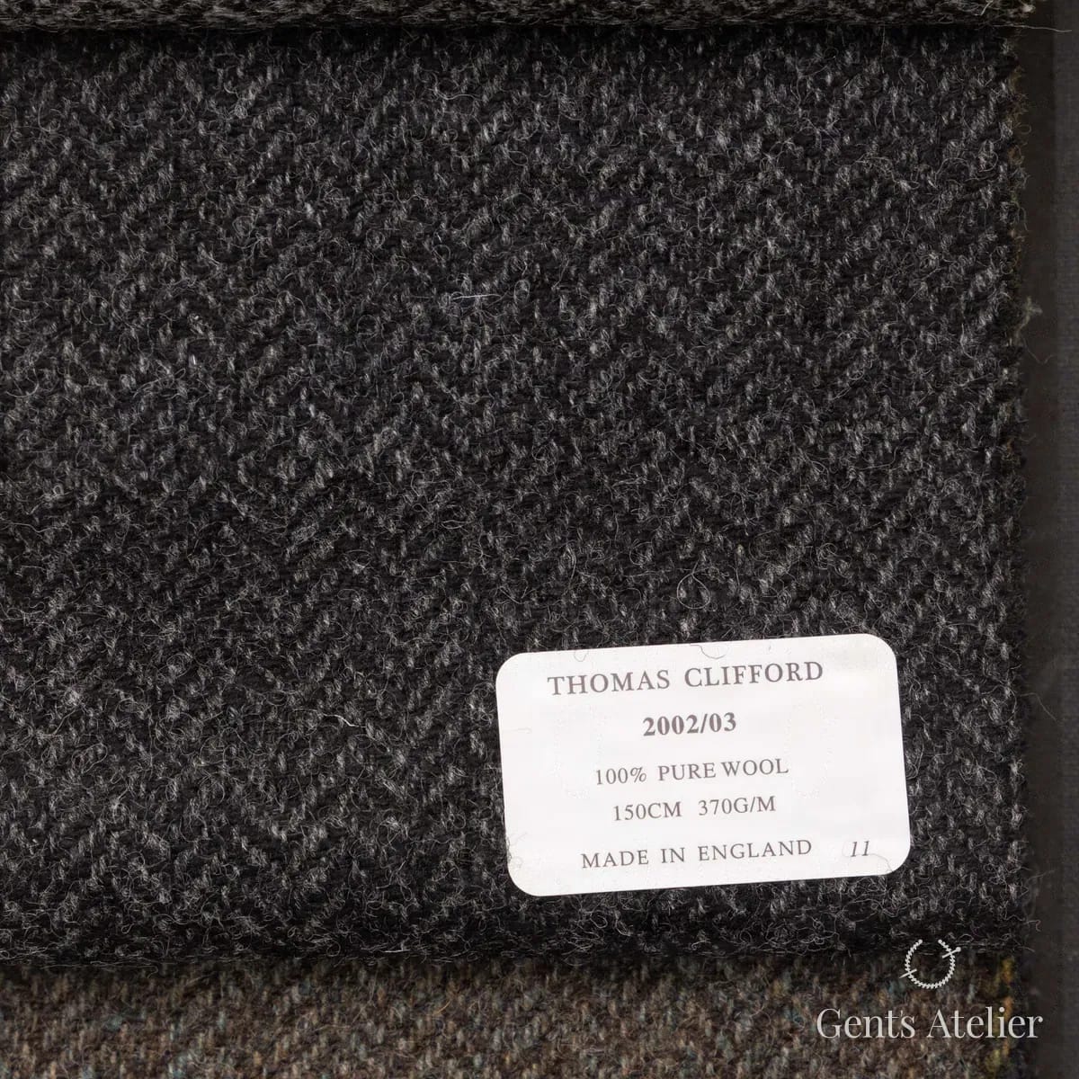 Образец ткани Thomas Clifford 2002/03 с этикеткой, чёрный