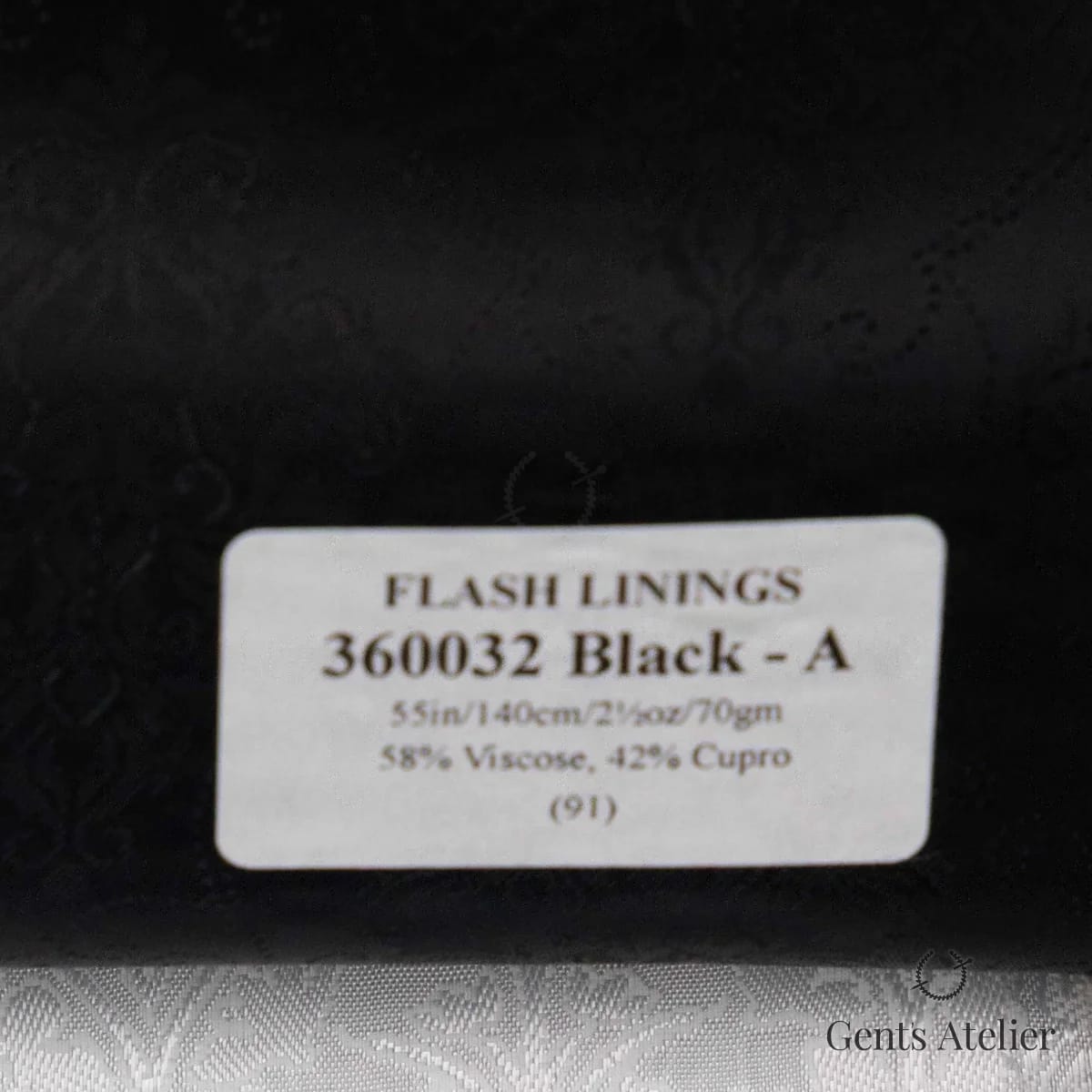 Образец ткани Gladson 360032 Black - A с этикеткой, чёрный тональный жаккард (пейсли-скролл)