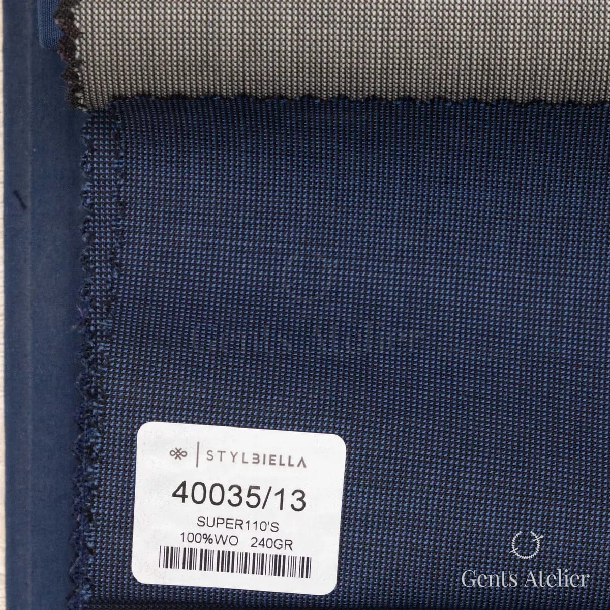 Образец ткани Stylbiella 40035/13 с этикеткой, синий