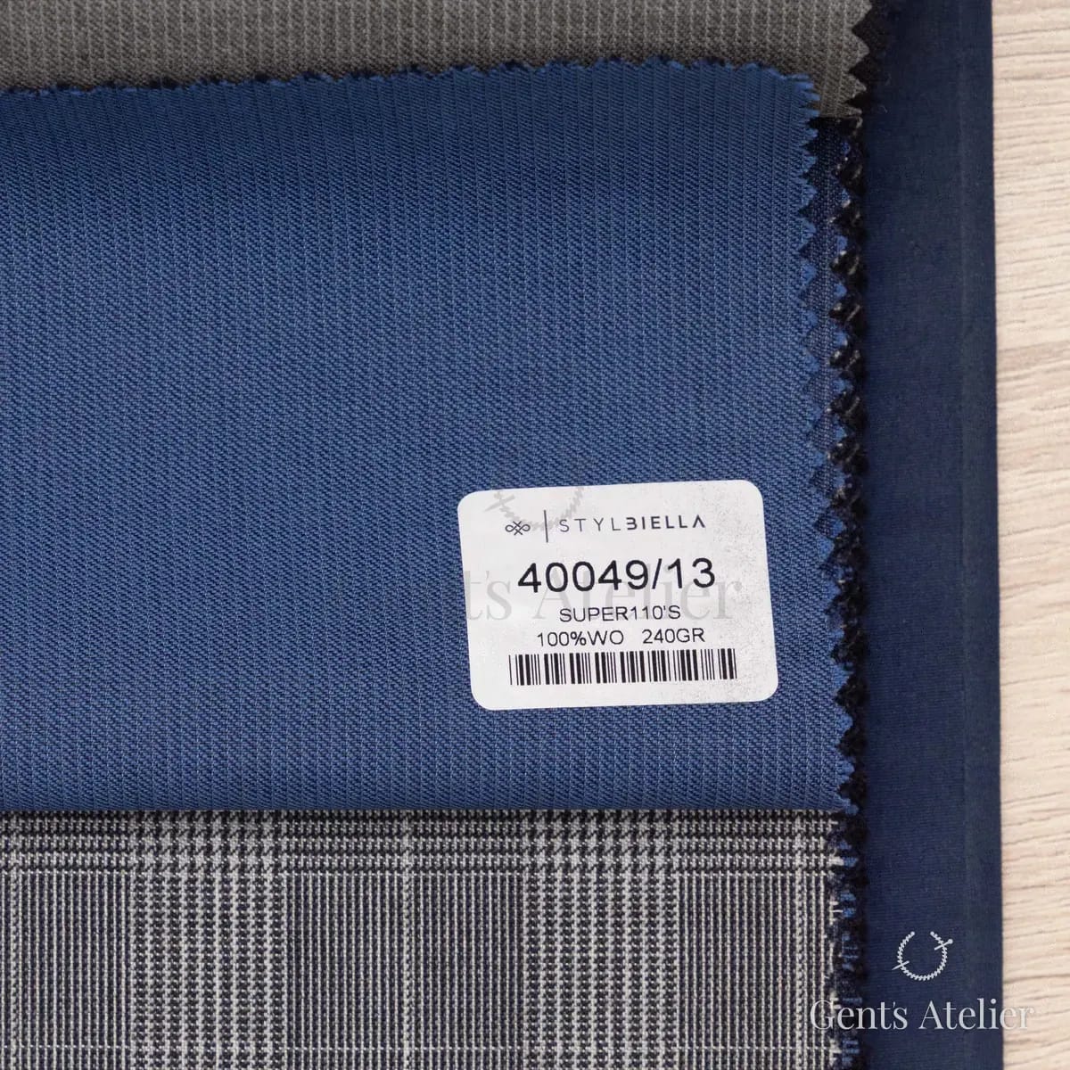 Образец ткани Stylbiella 40049/13 с этикеткой, синий