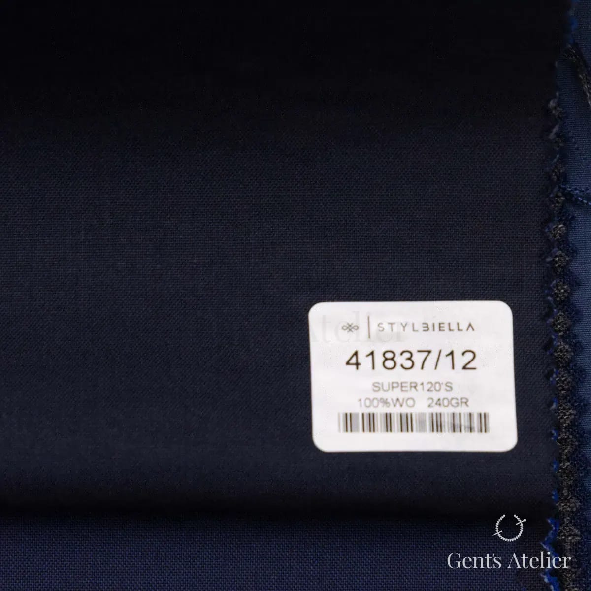 Образец ткани Stylbiella 41837/12 с этикеткой, тёмно-синий