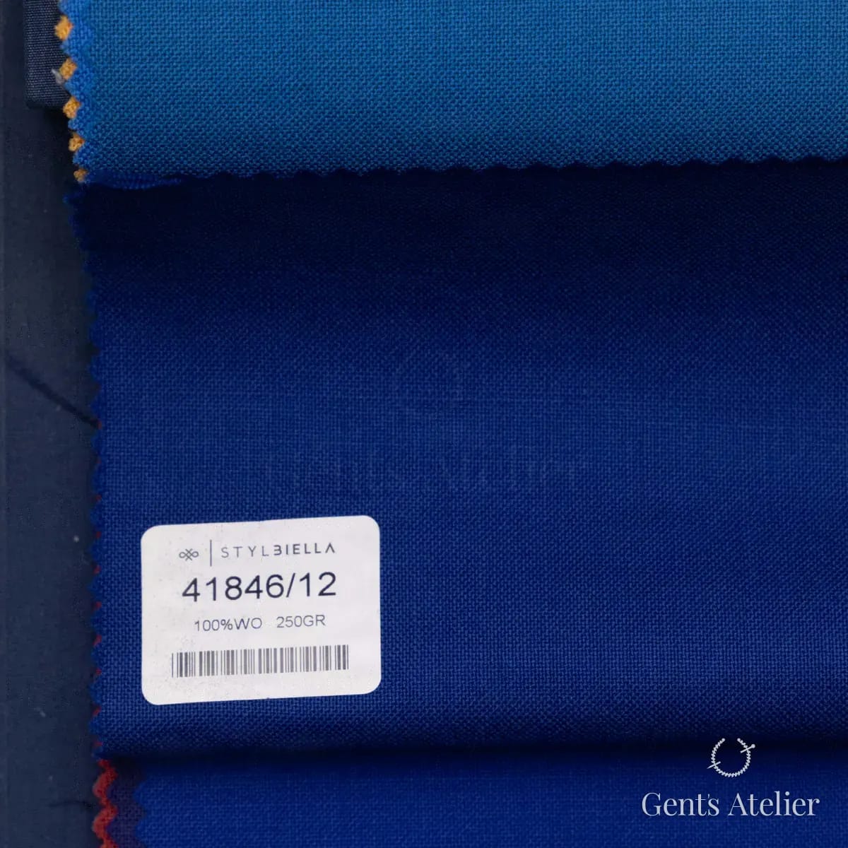 Образец ткани Stylbiella 41846/12 с этикеткой, синий
