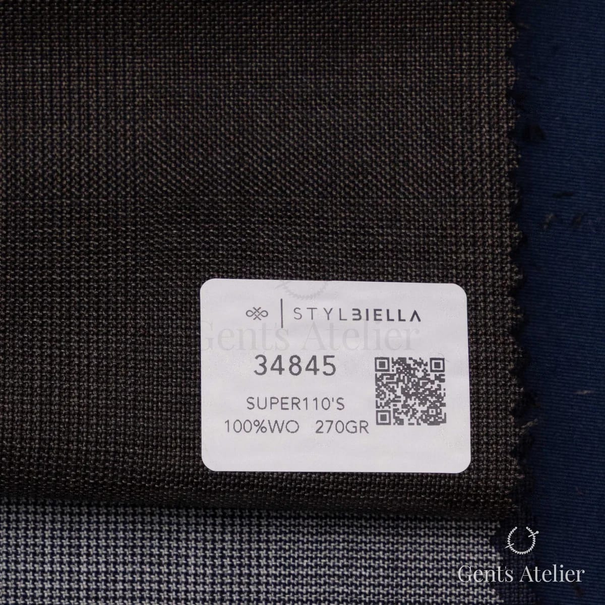 Образец ткани Stylbiella 34845 с этикеткой, тёмно-коричневый меланж с едва заметной клеткой виндоупейн